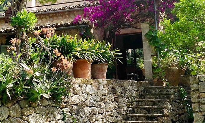 Deia House | Detached natural stone house with a beautiful garden and small pool.