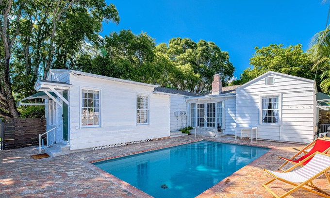 Poiciana Park II House | Dog-friendly home with pool, enclosed yard, patio, central AC & washer/dryer