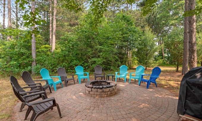 Necedah House | Dog-friendly riverfront retreat with huge yard, deck, grill, firepit, & kayaks