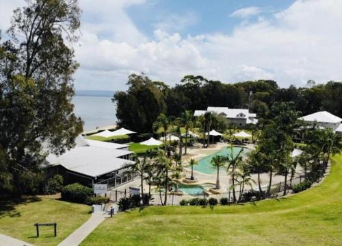 Cams Wharf Villa | Elysian Escape - 4 Pools, Lakeside, Rafferty's Resort