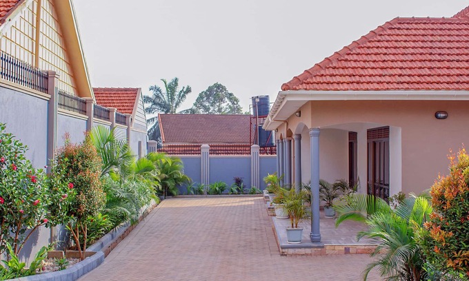 Bukoto House | Escape to Tranquility. A homely place close to everything but hidden from view.
