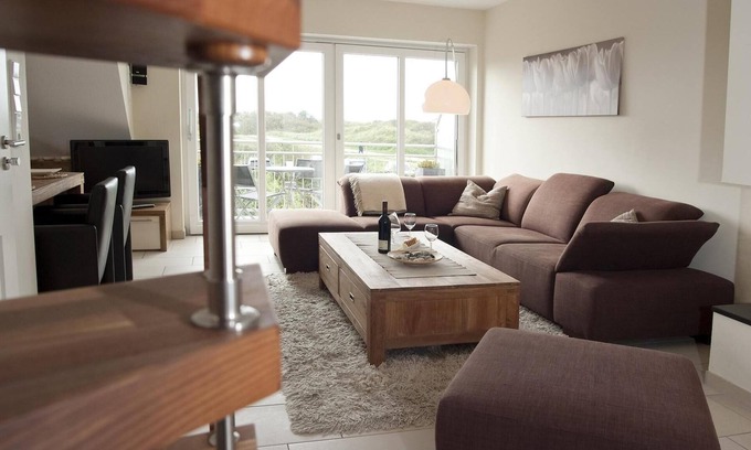Borkum Apartment | Exclusive 5*FeWo with sea view, roof terrace and gas fireplace.