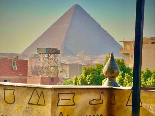 Giza Hotel | Farisha pyramids view