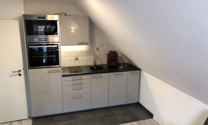 Neßmersiel Apartment | Ferienwohnung im Obergeschoß in Neßmersiel Ruhig und Zentral Gelegen