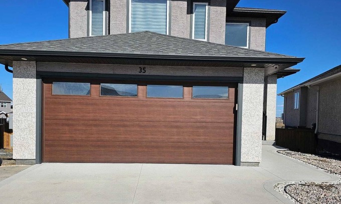 Transcona House | Flamingo Home! A family-friendly home with 4 bedrooms and 3 bathrooms.