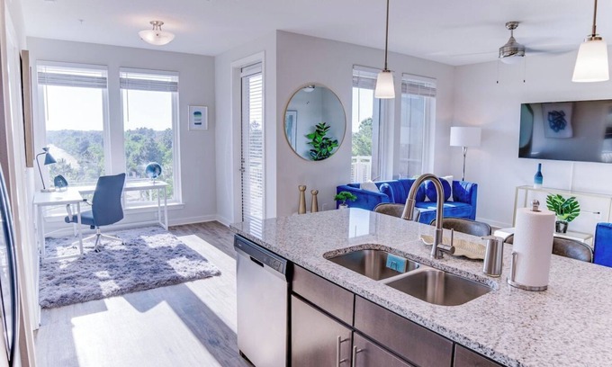 Deerwood Apartment | Fusion 1406 · Top floor modern getaway w/resort amenities!