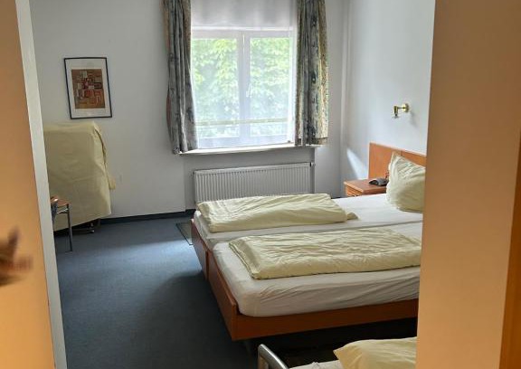 Munchen District Hotel | Gästezimmer im Trenner
