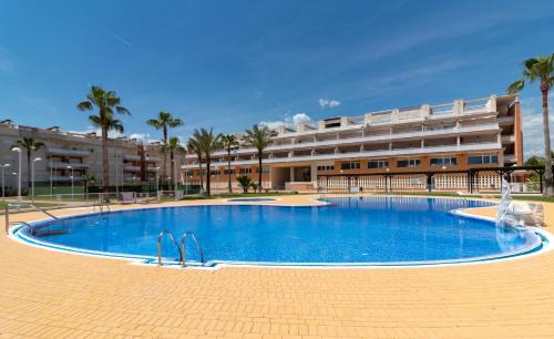 Playa de Almarda Apartment | Global Properties, Planta baja con piscina en Almenara