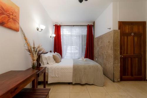 Catedral House | Habitación doble económica - Casa Esmeralda