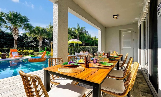 West Kissimmee House | Heated Pool/Hot Tub Game Room Outdoor Theater