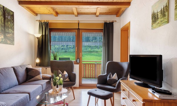 Schollach Apartment | Holiday Apartment 'West' with Shared Terrace, Shared Garden and Balcony