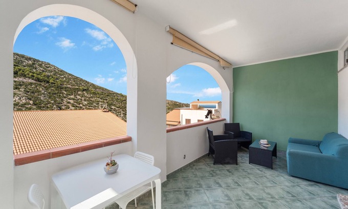 Buggerru House | Holiday Home 'Buggerru Hugo' with Sea View, Private Terrace and Air Conditioning