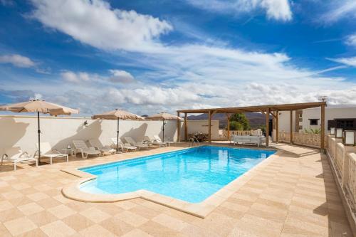 Puerto del Rosario Villa | Home2Book Serenity Villa with Private Pool