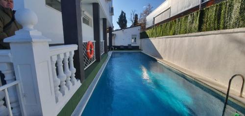 Palomas House | Hostal Escala Suites