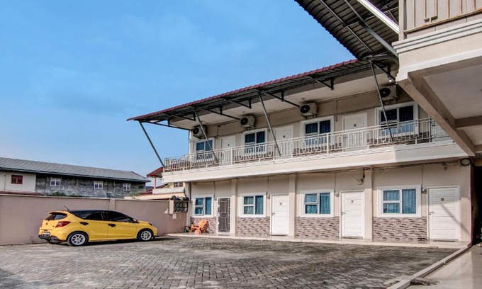 Pekanbaru Hotel | Hotel O Putri Homestay Syariah Near SPBU 14.282.694 (Air Hitam)
