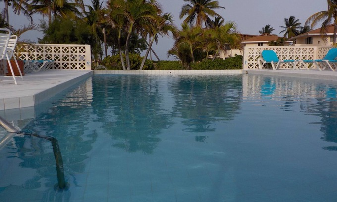 Kittian Village Condo | HUMMINGBIRD VIEW LARGE ONE BED CONDO SLEEPS 3 OVBERLOOKING THE OCEAN AND GARDENS
