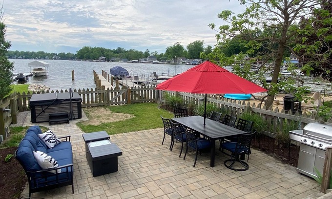 Paw Paw Lake House | Lake Life Awaits with Boat Pier, Beach, Hot Tub, Parking on Paw Paw Lake