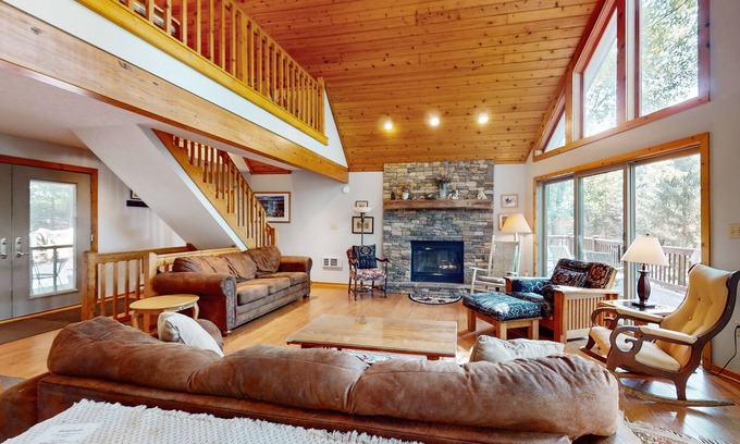McHenry Ski Chalet | Lake-view home with hot tub, dock, decks, firepit, & AC - near slopes, dogs OK