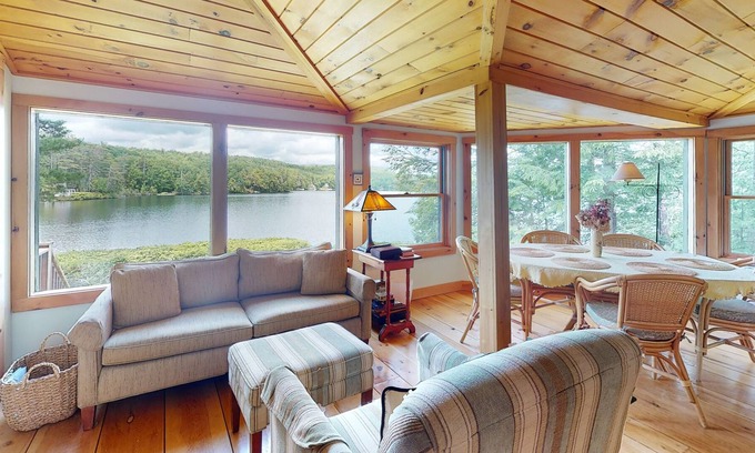 Litchfield Cabin | Lakefront home with firepit, yard, dock/water access, outdoor area, & W/D