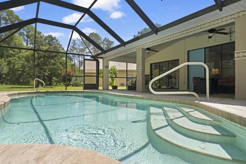 Palm Coast House | Large Palm Coast Pool Paradise - Family Gatherings