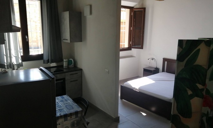 Faenza Apartment | Large studio apartment with separate rooms
