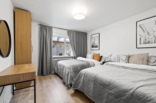 Downtown Apartment | Lokastígur Charming and Inviting Apartment