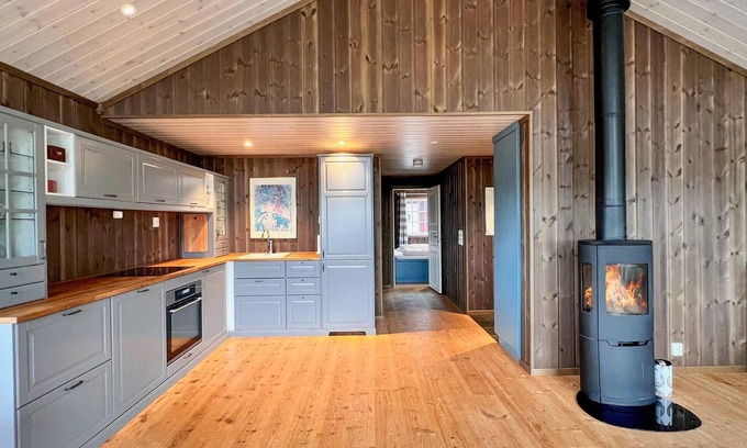 Svingvoll House | Look forward to a fantastic view of the mountains from this comfortable vacation home.