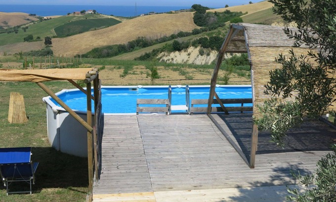 Cologna Spiaggia Villa | Lovely apartment in villa with A/C, hot tub, pool, WIFI, TV, patio, pets allowed and panoramic v.
