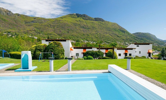 Capriasca Apartment | Lovely apartment for 4 guests with pool, WIFI, TV, patio, pets allowed and panoramic view