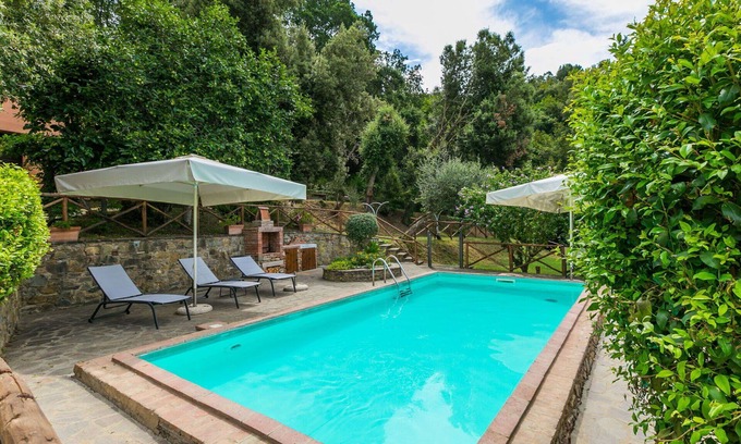 Castagneto Carducci Villa | Lovely apartment in villa for 5 guests with WIFI, A/C, pool, TV, patio and pets allowed