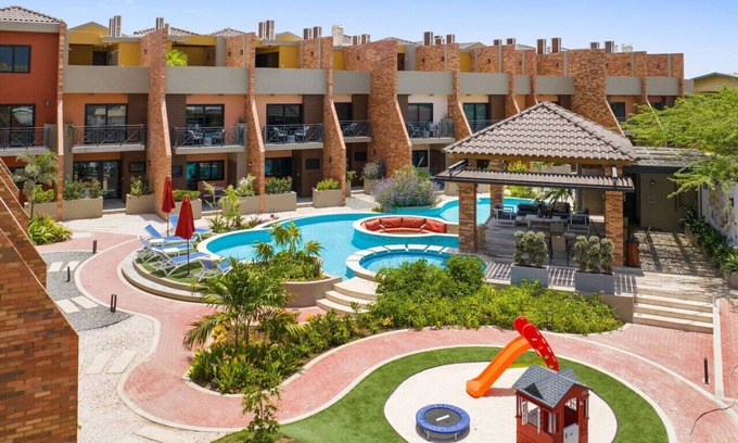 Tuscany Residence Aruba House | LUX Townhouse 5 min walk to Ritz and Palm Beach at Porta Al Sole 16 by Bocobay