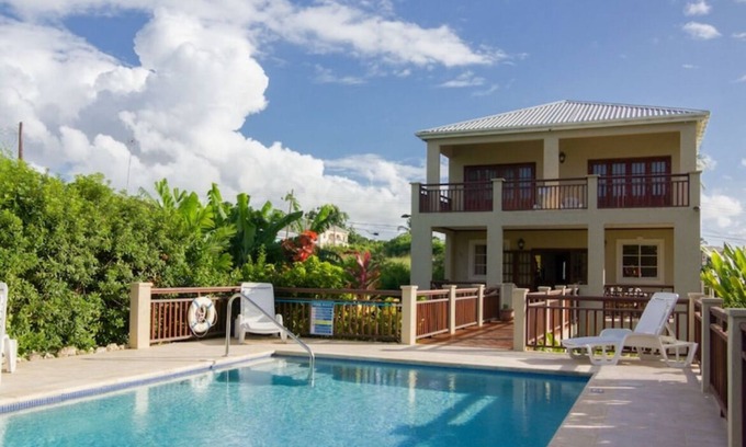 Weston Villa | Luxury retreat with contemporary design less than 5 minutes walk to the beach