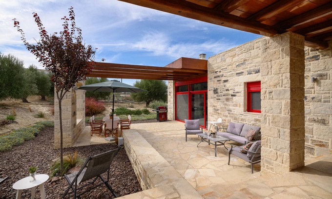 Faistos Villa | Luxury stone house in an olive Grove, surrounded by a beautiful garden