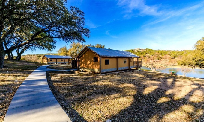 Ingram RV Rental | Luxury Tented Cabin Glamping Escape, with River Access in Ingram, Texas