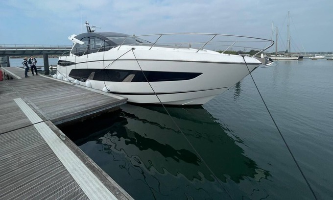 Lower Swanwick Boat Rental | Luxury yacht moored in a tranquil marina setting
