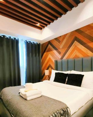 San Fernando Apartment | Modern Elegance Escape in Azure North Bali Tower near Malls, Airport and NLEX
