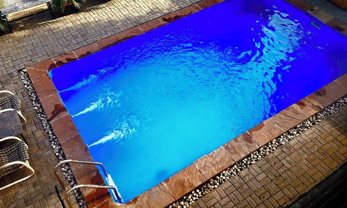 Lahore Hotel | Modern Lahore Retreat withnSwimming Pool & Prime City Access.