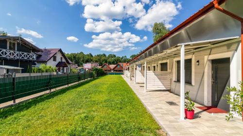 Sztutowo Cabin | Morskie Domki Apartamentowe by PIAMOLA