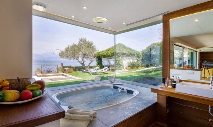 Ispra Villa | My Rental Homes - Villa Isa: worderful pool, private beach, and boat access.