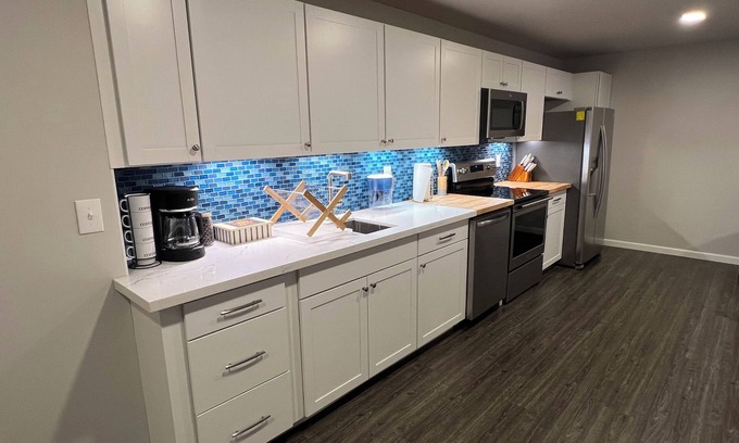 Mid-Hillside Apartment | New 2-bedroom Apt on 2.5 forested acres close to airport, downtown, and trails.