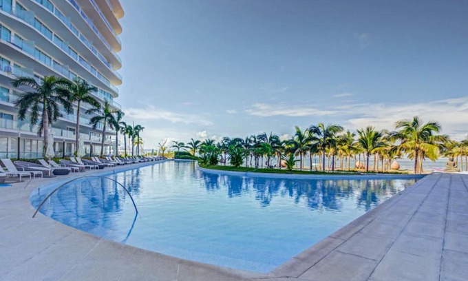 Flamingos Apartment | NEW Beachfront Marítima Playa Condos, 2 Pools and Gym