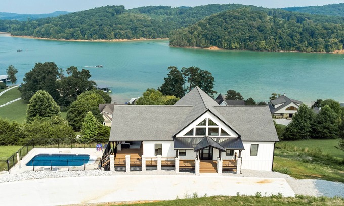 La Follette House | New Norris Lake Home with Private Heated Saltwater Pool and Hot Tub in Deerfield