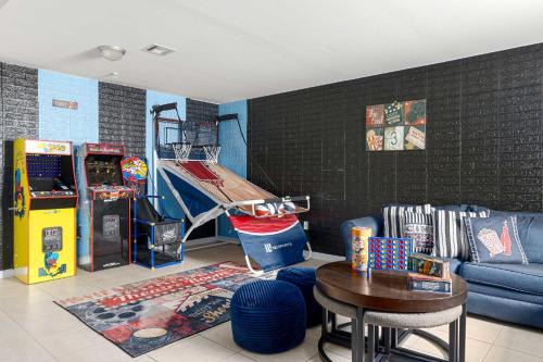 Newark House | Newark Gem Ruby 3BR, 3BA - Sleeps 14 - Walk to Prudential Center and Newark Penn Station, Near EWR and American Dream Mall, includes Parking - WiFi - Laundry - Backyard - Gym