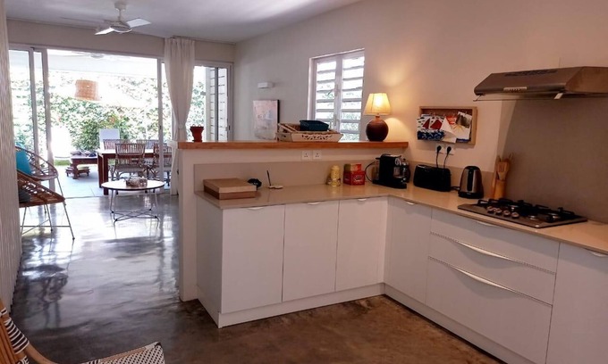 Roches Noires Villa | Newly built townhouse on the beach.