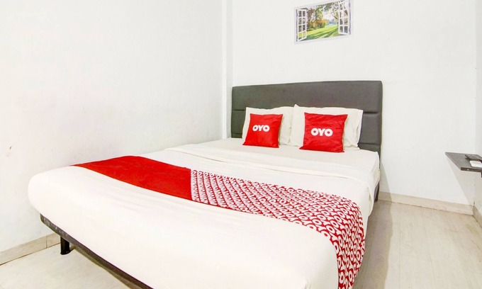Gambir Hotel | OYO 90310 Cosmo Harmoni