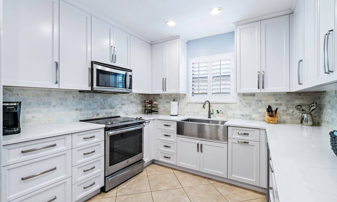 North Palm Beach House | Palm Beach charm, close to beach, dine nearby, tranquil patio & yard