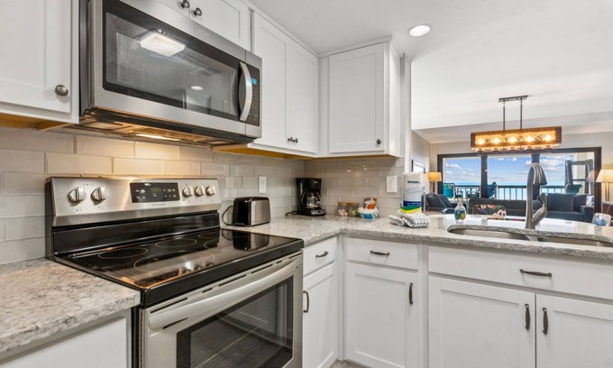 Amelia City Condo | Palm Trees and Ocean Views: Your Coastal Retreat