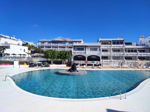 Costa Teguise Apartment | Palmeras Apt - Pool & Terrace - next to Beach