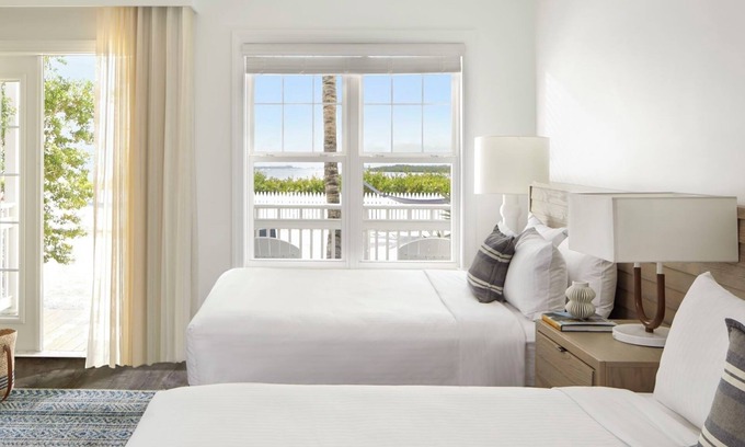New Town Hotel | Paradise Unit with Convenient Location, Shuttle Service, Onsite Parking, Pools!