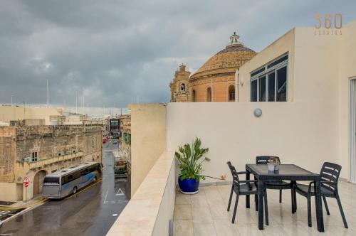 Mosta Apartment | Penthouse in Mosta with city views & terrace by 360 Estates